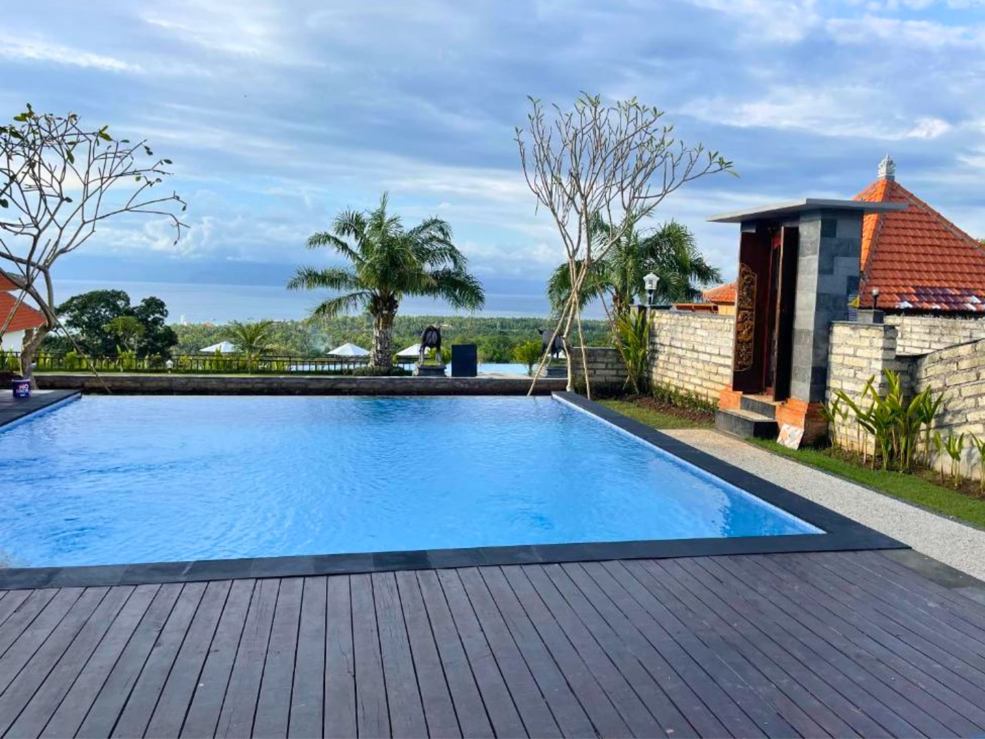 Two-Bedroom Villa — private infinity pool with sun loungers