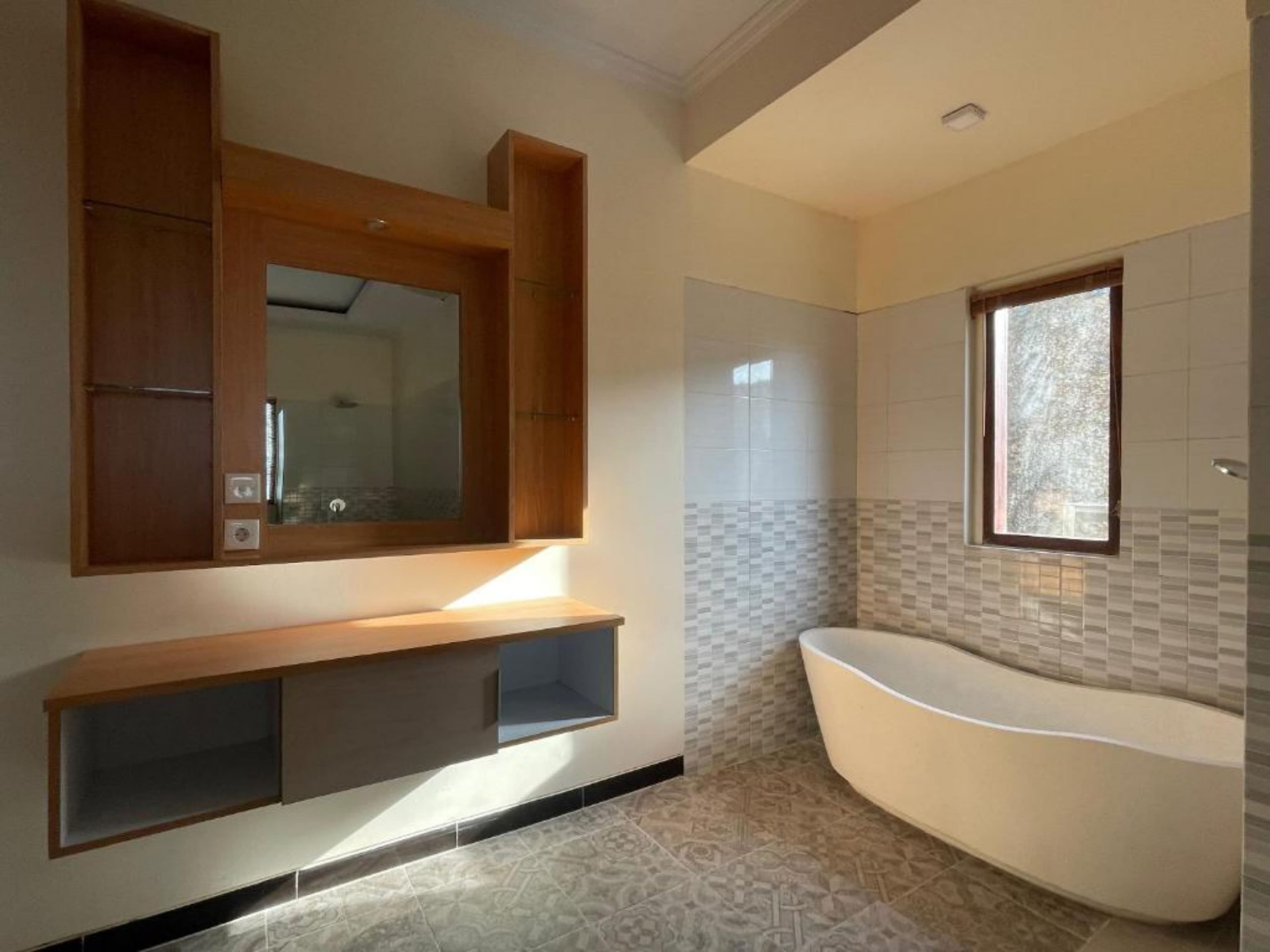 Two-Bedroom Villa — bathroom with bathtub and vanity